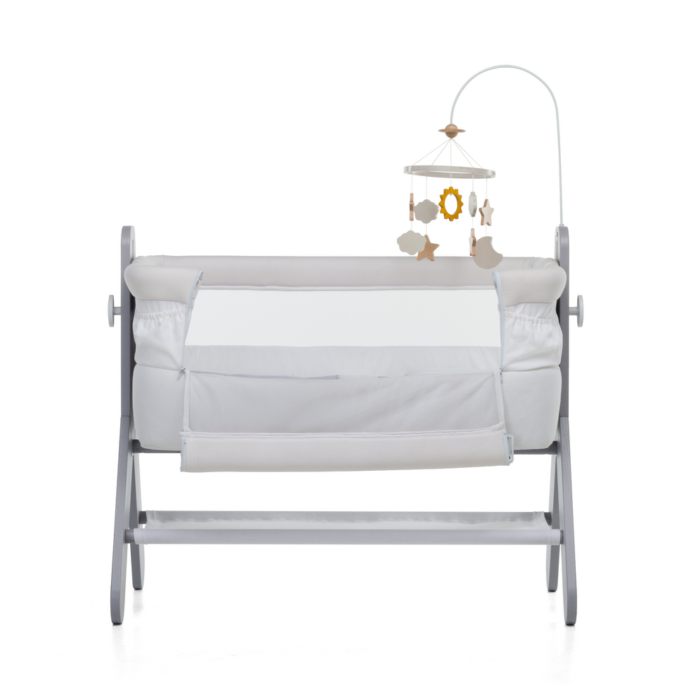 A bedside baby crib by Foppapedretti features a high-quality solid ash wood, designed and manufactured in Italy. The height can be adjusted to 5 positions to be adapted to any type of bed.