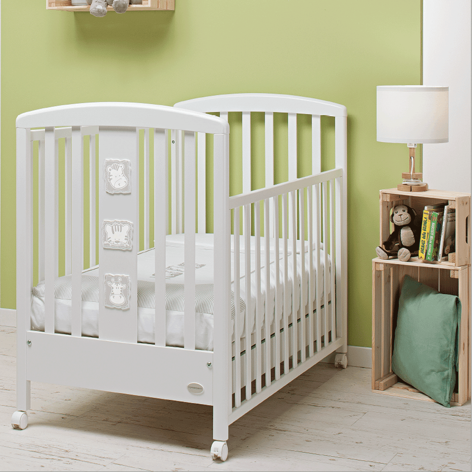 Babyzoo baby cot designed with one side adjustable into two heights and the baby cot can be opened at the side and folded up under the cot turned into a sofa.