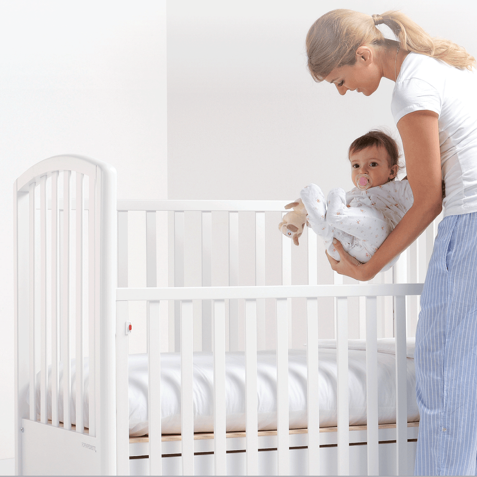 All Foppapedretti baby cots are designed with one side adjustable into two heights and the baby cot can be opened at the side and folded up under the cot turned into a sofa.